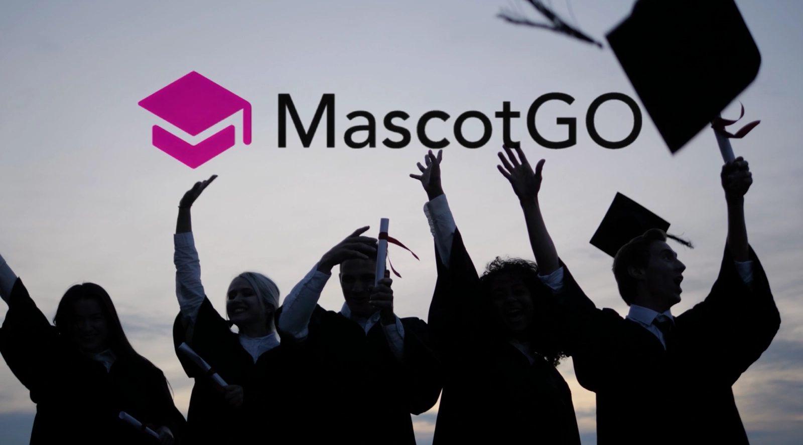 Graduates throwing caps in celebration